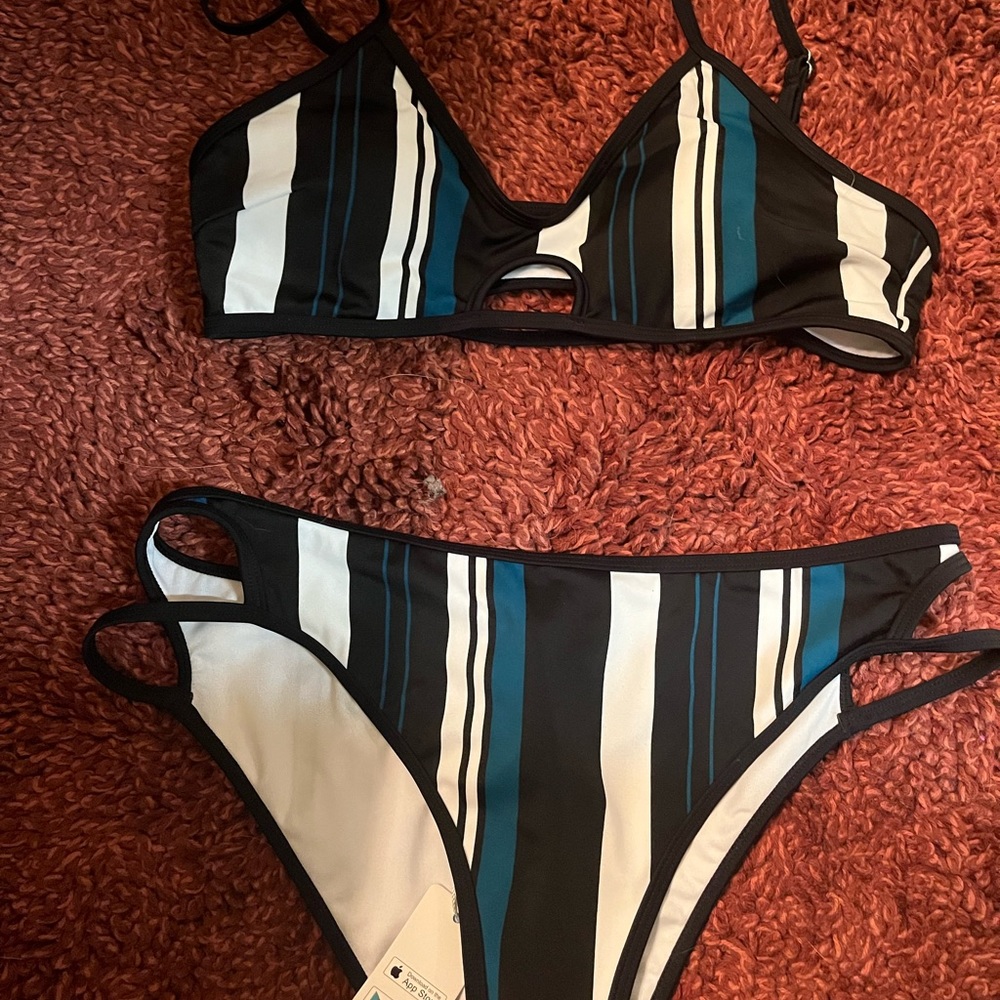 Size large tags still on bathing suit